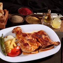 نص دجاج على الفحم